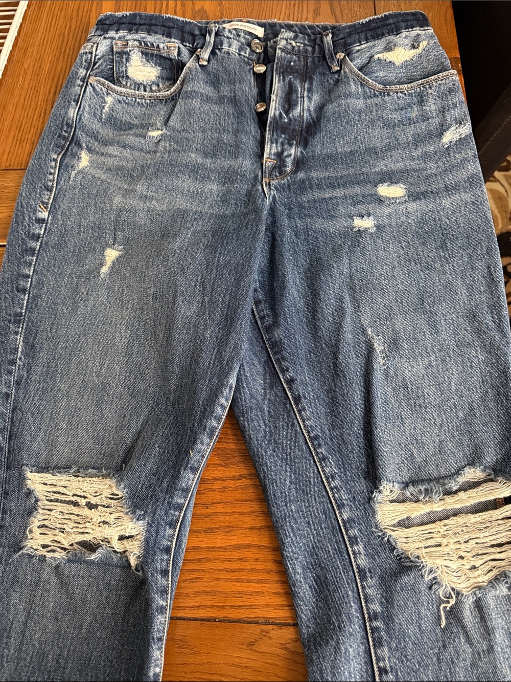 Good American Distressed Boyfriend Jeans in Faded Blue Denim